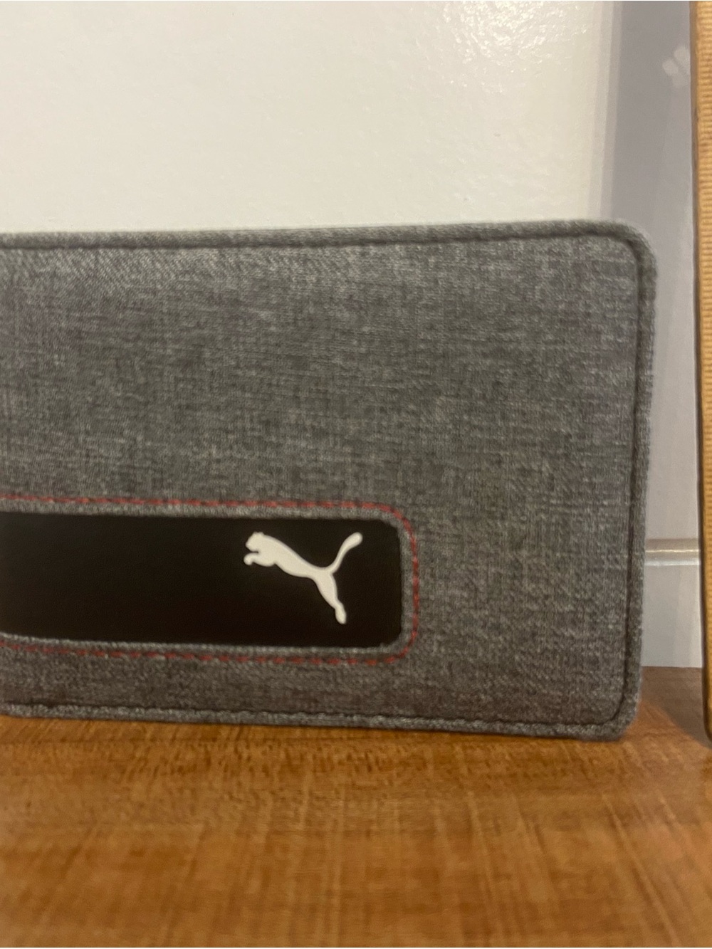 Puma Gray wallet with Red Stitching and Black Logo Patch
